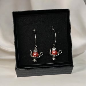 Lyserød øreringe  – produktbillede