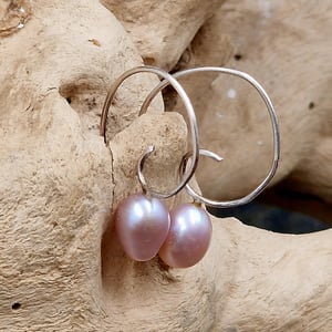 Rosa snabel ørekroge. – produktbillede