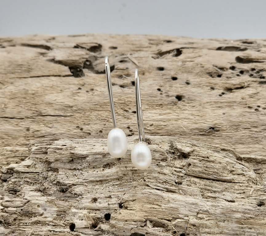 Ørekroge med ferskvandsperler.