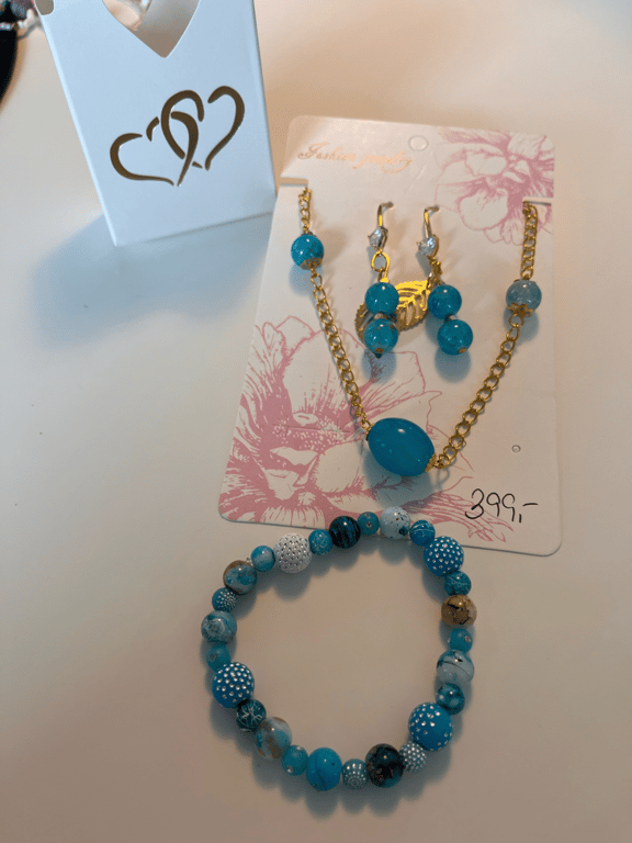 Sæt med smukke laguneblå øreringe og halskæde billede 4