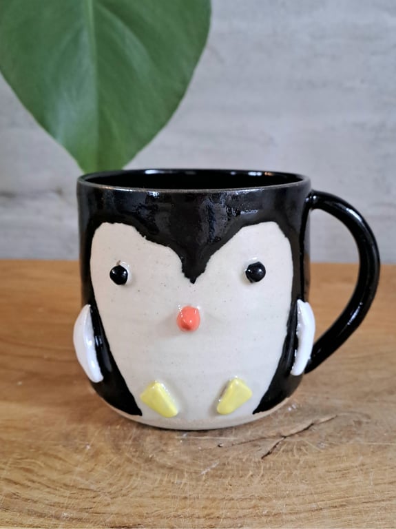 Pingvin koppen kan indeholde 350 ml.