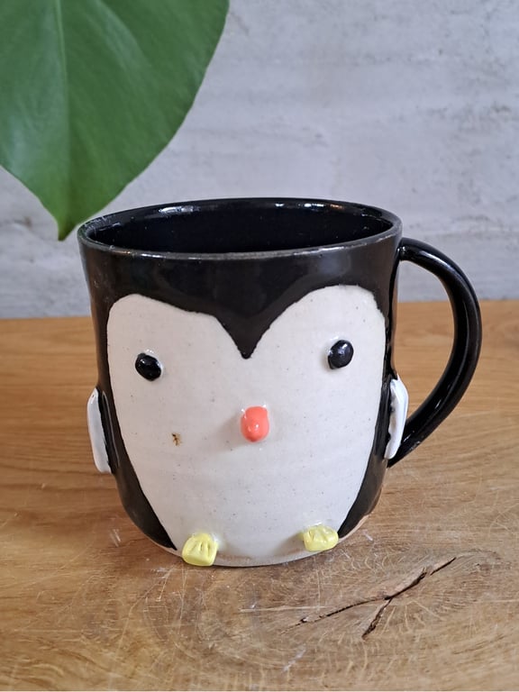 Pingvin koppen kan indeholde 350 ml.