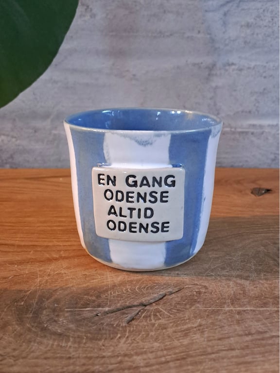 Koppen kan indeholde 275 ml.