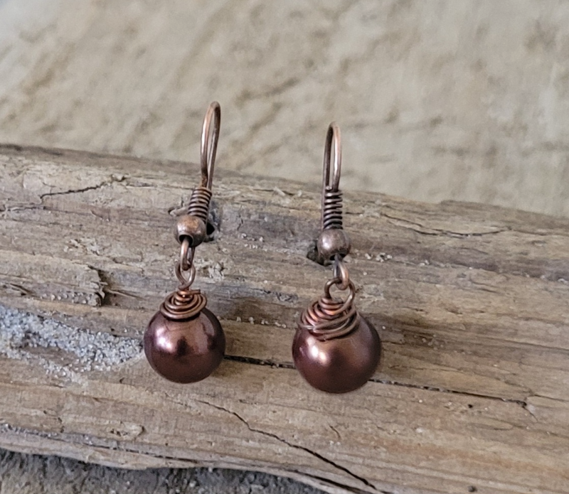 Ørekroge med ferskvandsperler.