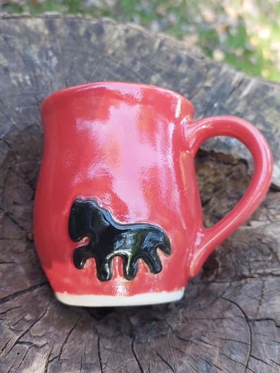 Islænder koppen i rød med sort islænder  