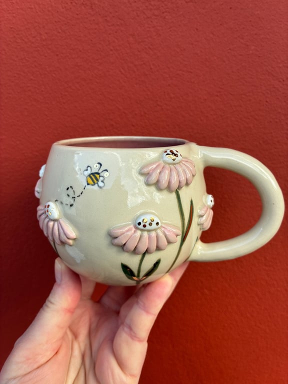 Stor blomsterkop med guld