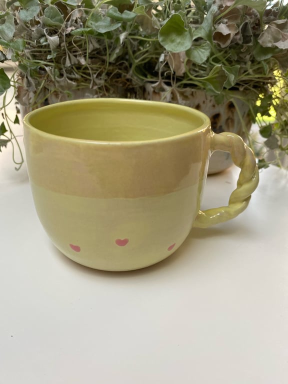 Gul kop med snoet hank