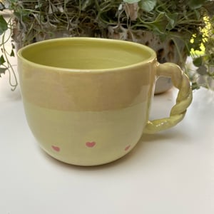 Gul kop med snoet hank – produktbillede