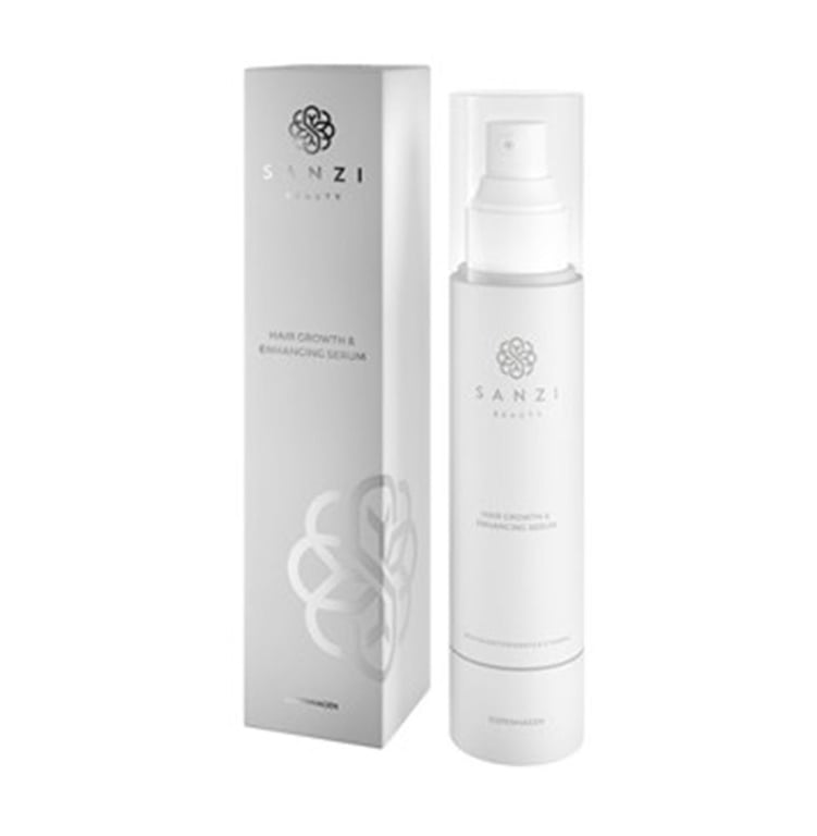 Billede af en hvid flaske med pumpe og en matchende æske ved siden af, begge mærket "SANZI Beauty" med teksten "Hair Growth & Enhancing Serum".