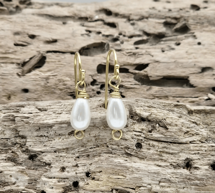 Ørekroge med ferskvandsperler.