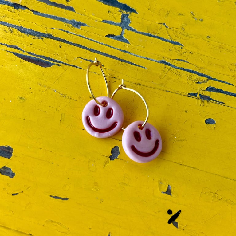 Ørering lyserød smiley m. rødt ansigt 