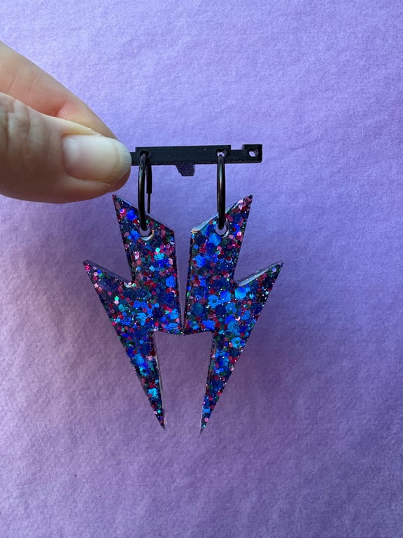 Store lyn i blå/pink glimmer