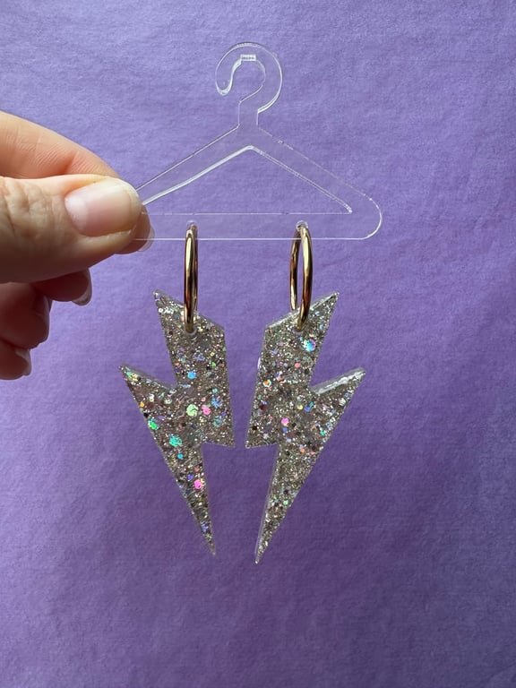 Lyn i guld/sølv glimmer i guld creol