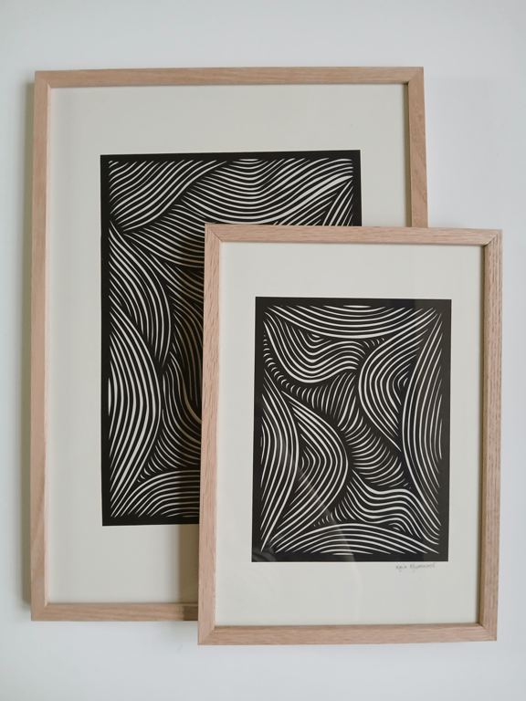 A4 papercut, sort, knækket hvid, indrammet  billede 2