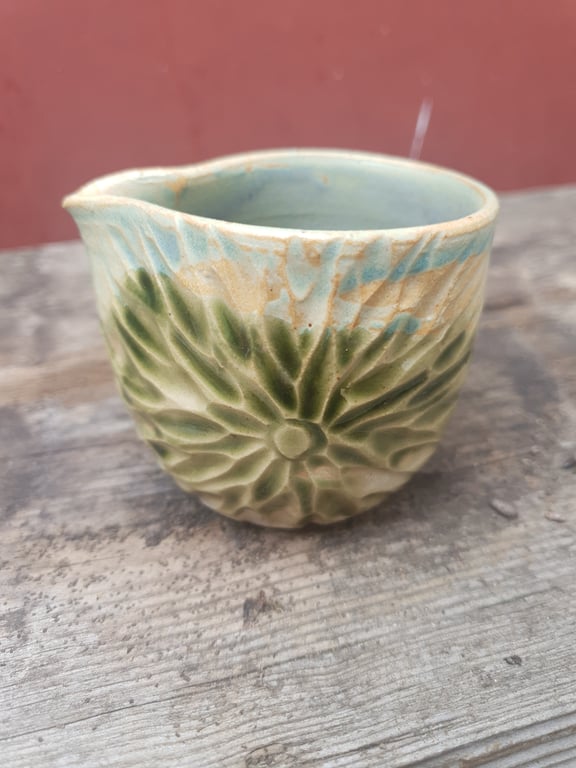 Lille solblomst kande 
