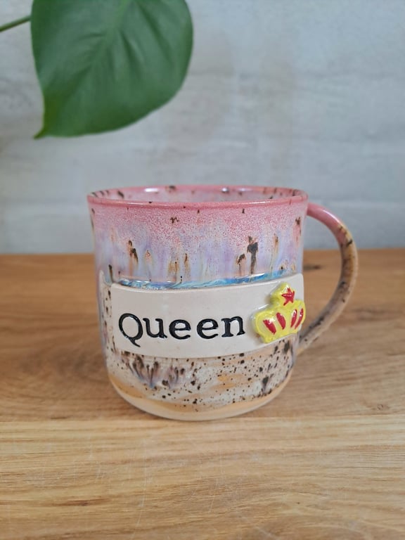 Queen koppen kan indeholde 325 ml.