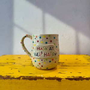 Husk at vær' happy  – produktbillede