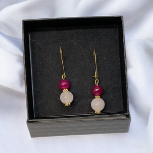 Lyserød øreringe  – produktbillede