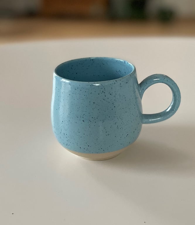 Buttet kop, lyseblå