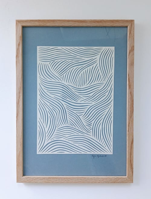 A4 papercut, dueblå, indrammet 