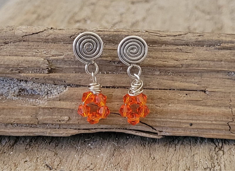 Orange krystal øretikker.