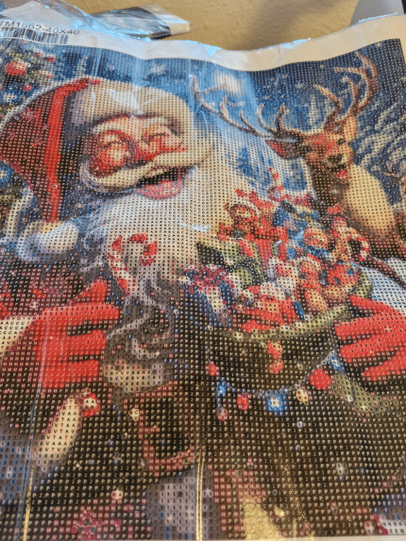 Et pænt jule billede med julemanden samme med sin rensdyr den er 40 ×40 