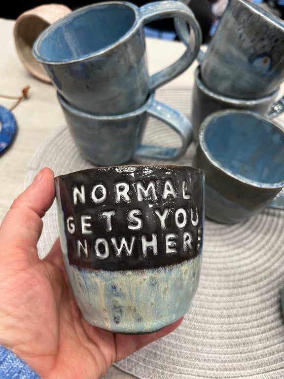 “Normal gets you nowhere” kop.