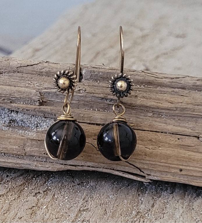 Ørekroge med røgkvarts.