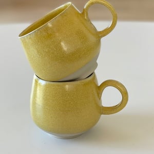 Buttet kop, hørgul – produktbillede