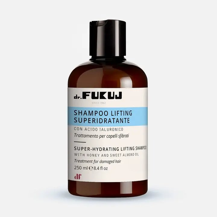 Brun flaske med sort låg med dr. Fukuji shampoo, Super-Hydrating Lifting Shampoo med honning og sødmandelolie, 250 ml.