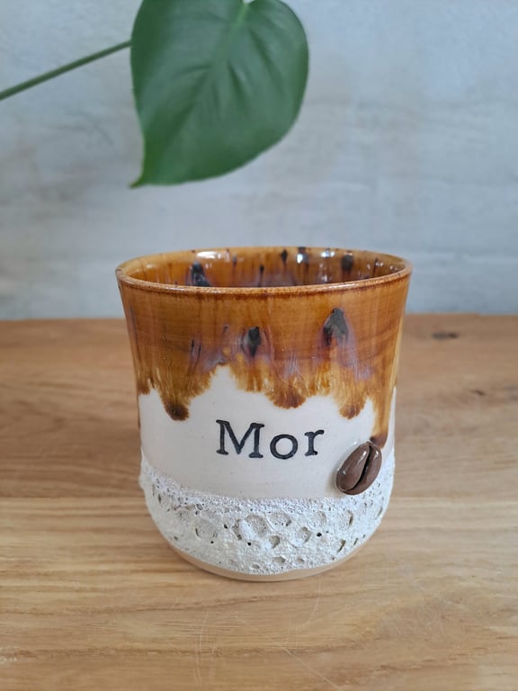 Mor koppen kan indeholde 325 ml.