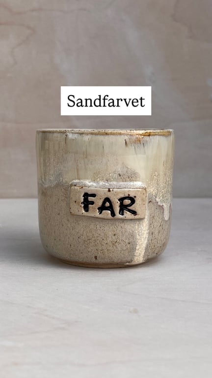 Kop med tekst på plade billede 6