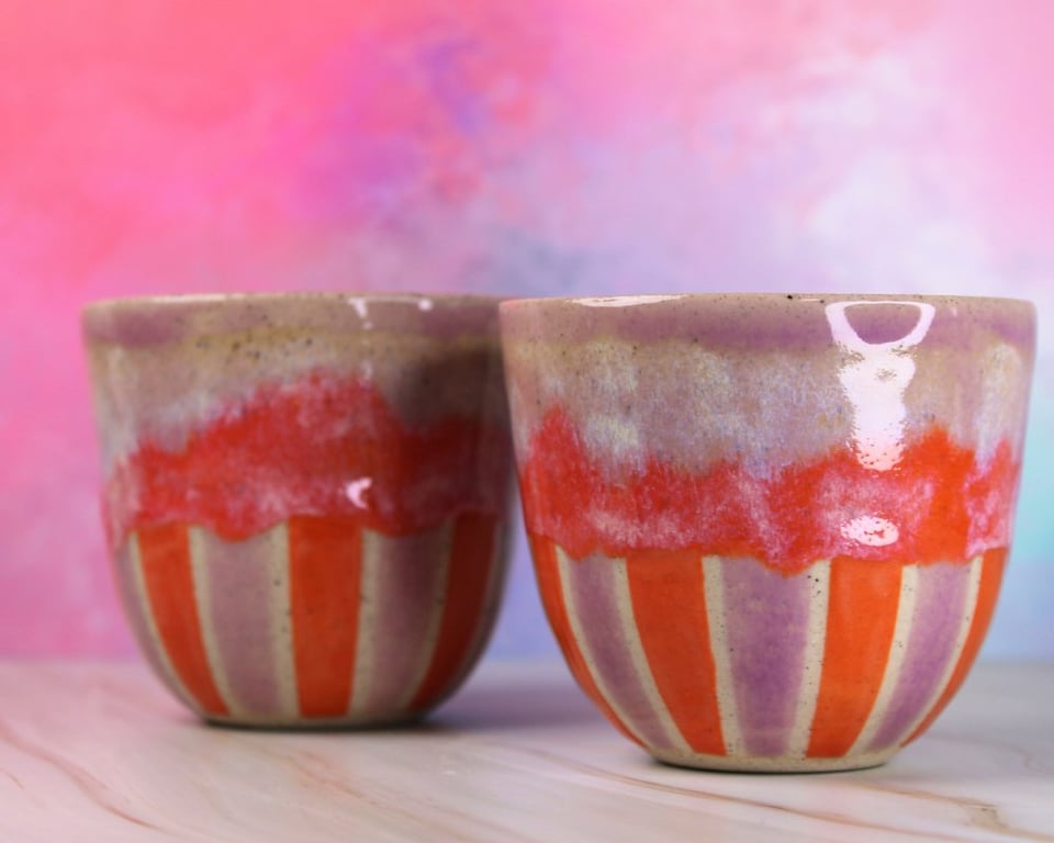 Tivoli-krus, orange og lilla nuancer