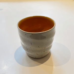 Spiralkrus råhvid med nister, orange – produktbillede