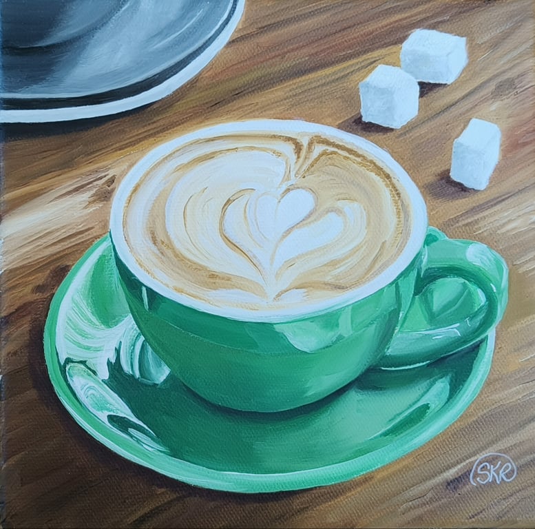 Grøn kop kaffe med sukkerknalder. 20*20