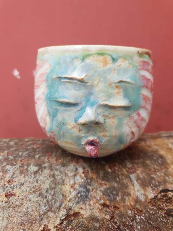 Ansigtskop der rækker tunge