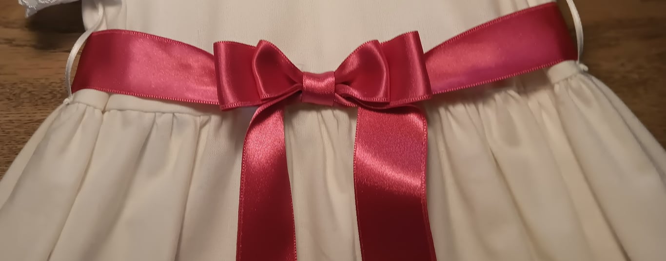 Dobbelt sløjfe i Fuscia