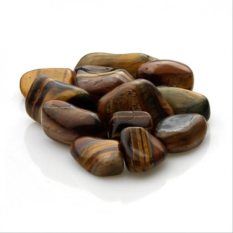 Polerede tigerøje-sten i forskellige størrelser med brune og gyldne striber, placeret på en hvid overflade. (2)