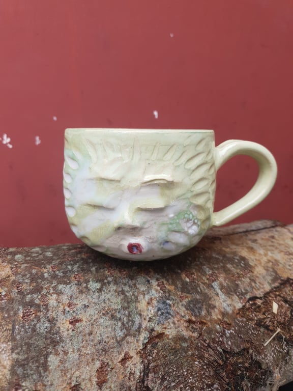 Syngende ansigtskop med hank ( 3 dl )