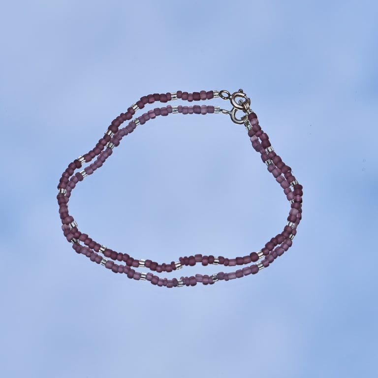 Armbånd med glasperler