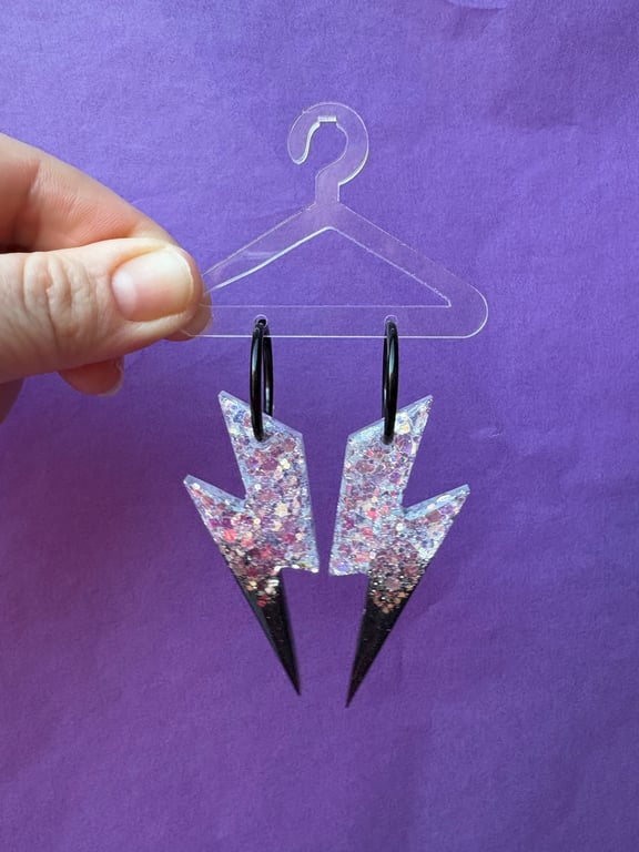 Store lyn i sort/sølv