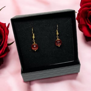 Røde øreringe  – produktbillede