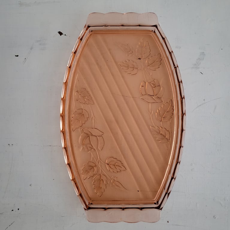 Rosafarvet vintage rouladefad i presset glas