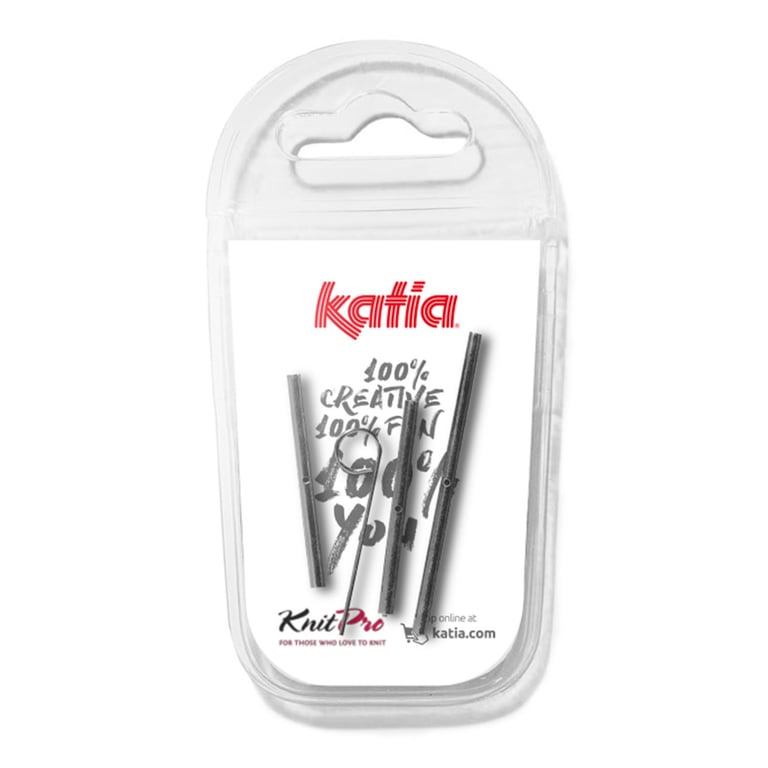 Transparent plastikpakke med tre metalstrikkepinde fra mærket Katia, pakket med et hvidt kort med rødt logo og teksten "100% creative 100% fun".