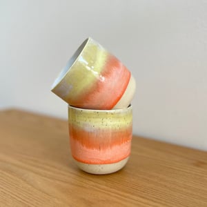 Orange-gule solskins-kopper – produktbillede