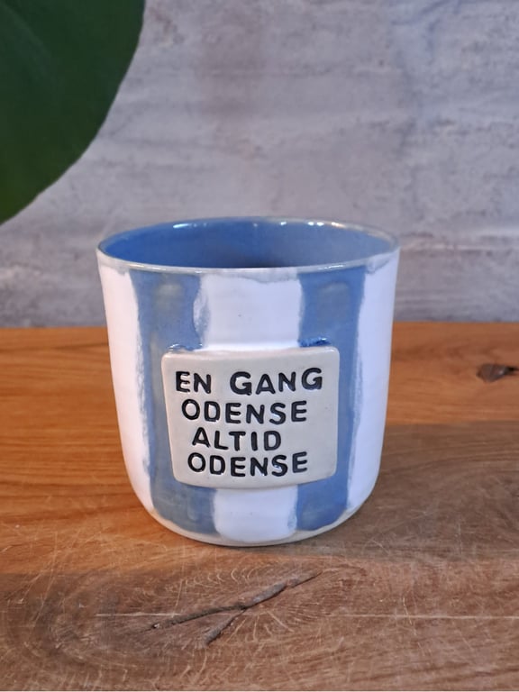 Koppen kan indeholde 300 ml.