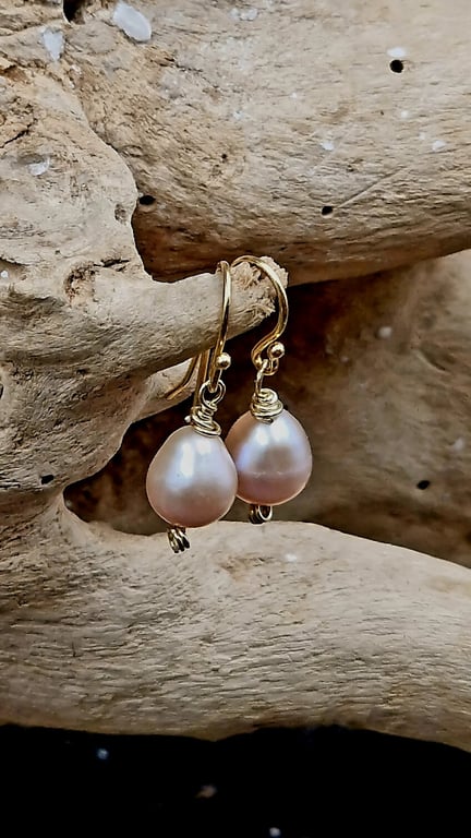 Rosa perle ørekroge.