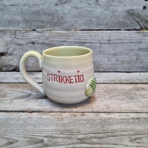 Strikkekop, gul – produktbillede