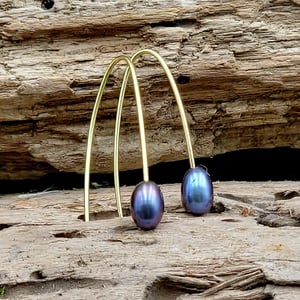 Dyb lilla ørekroge  – produktbillede