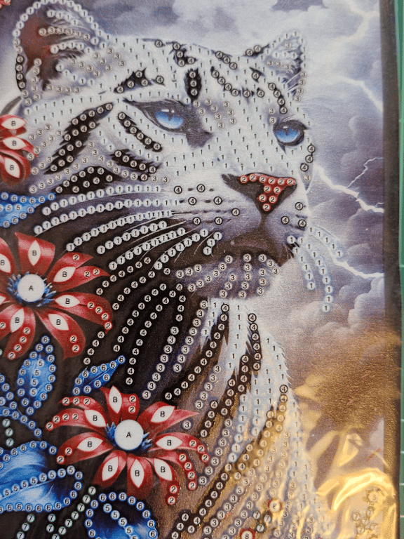 En pæne notebook med en hvid tiger 